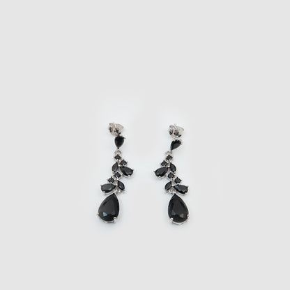 Silver earrings with black stones.